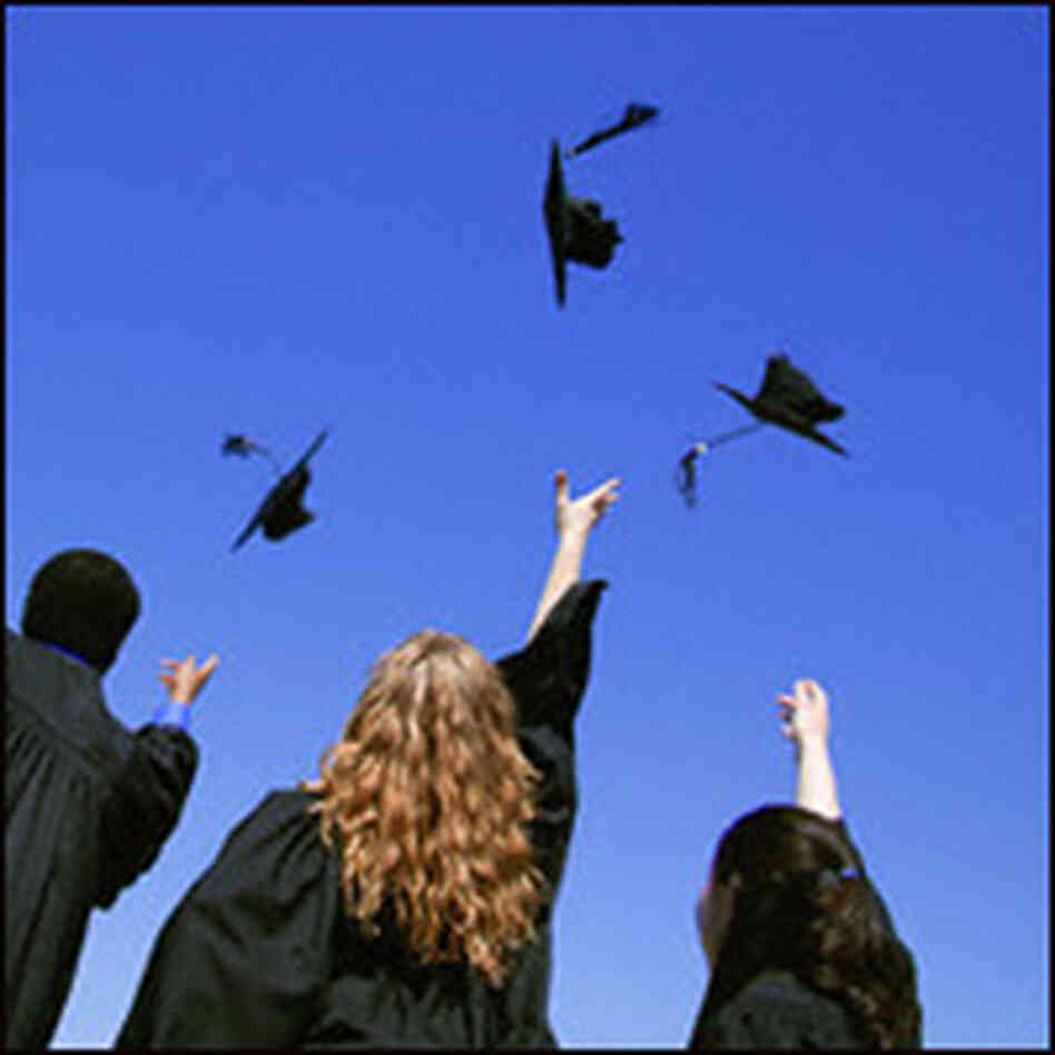 Students celebrate their graduation Students celebrate their graduation
