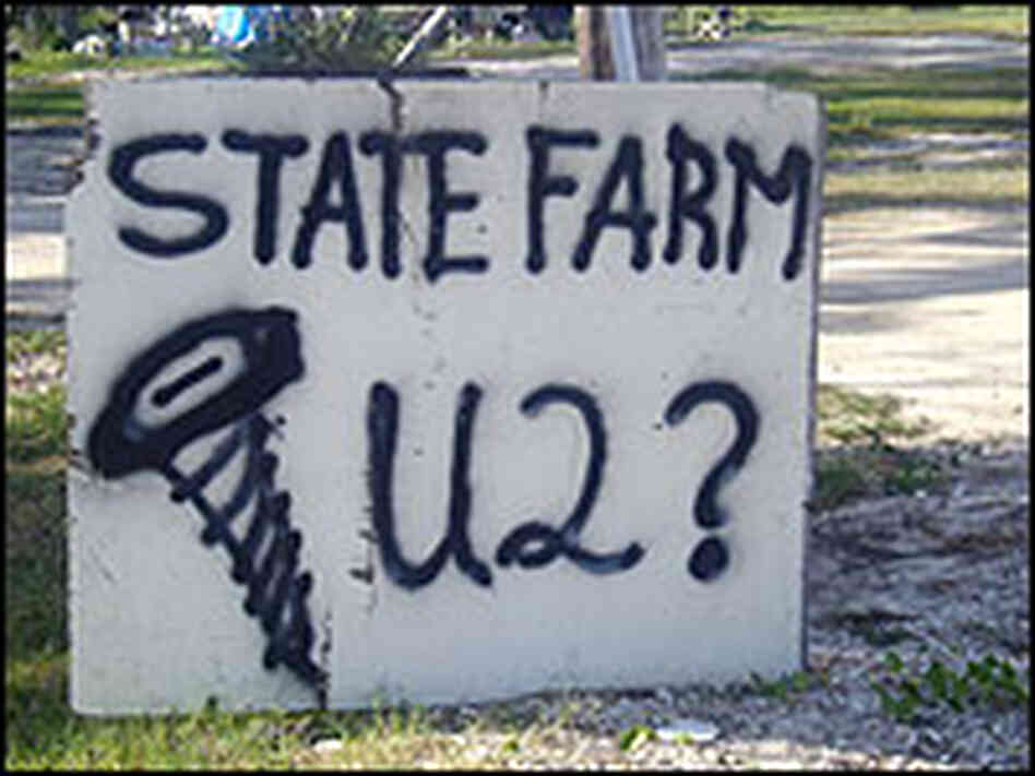 An anti-State Farm sign in a yard. An anti-State Farm sign in a yard.