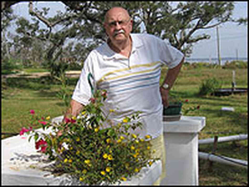 Dr. Wesley McFarland in the lot where his home once was. Dr. Wesley McFarland in the lot where his home once was.