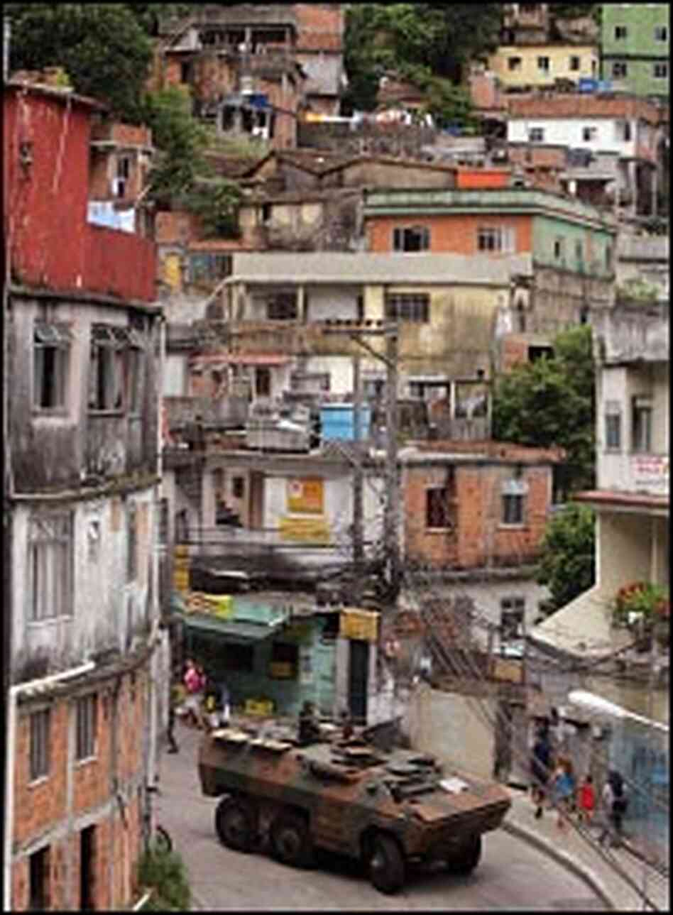 Brazilian soldiers patrol the Rocinha favela in Rio de Janeiro, March 2006. Brazilian soldiers patrol the Rocinha favela in Rio de Janeiro, March 2006.