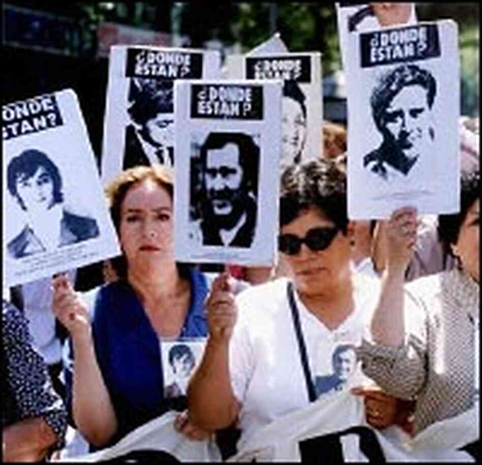 Protesters in 2000 demand the extradition of Gen. Pinochet from Great Britain to face trial in Chile Protesters in 2000 demand the extradition of Gen. Pinochet from Great Britain to face trial in Chile