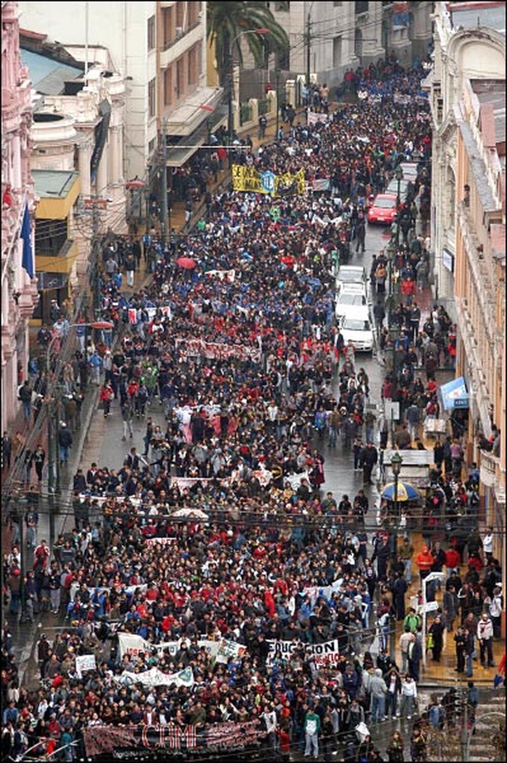 Thousands of Chilean students march during a massive protest rally in the streets of Valparaiso