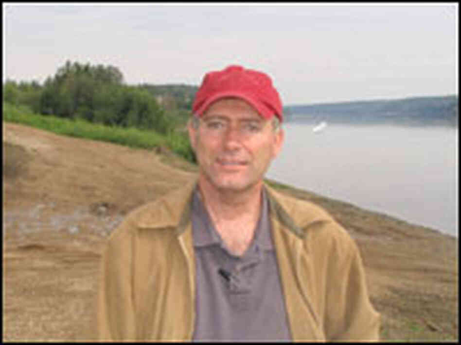 Neil Camarta in front of river Neil Camarta in front of river