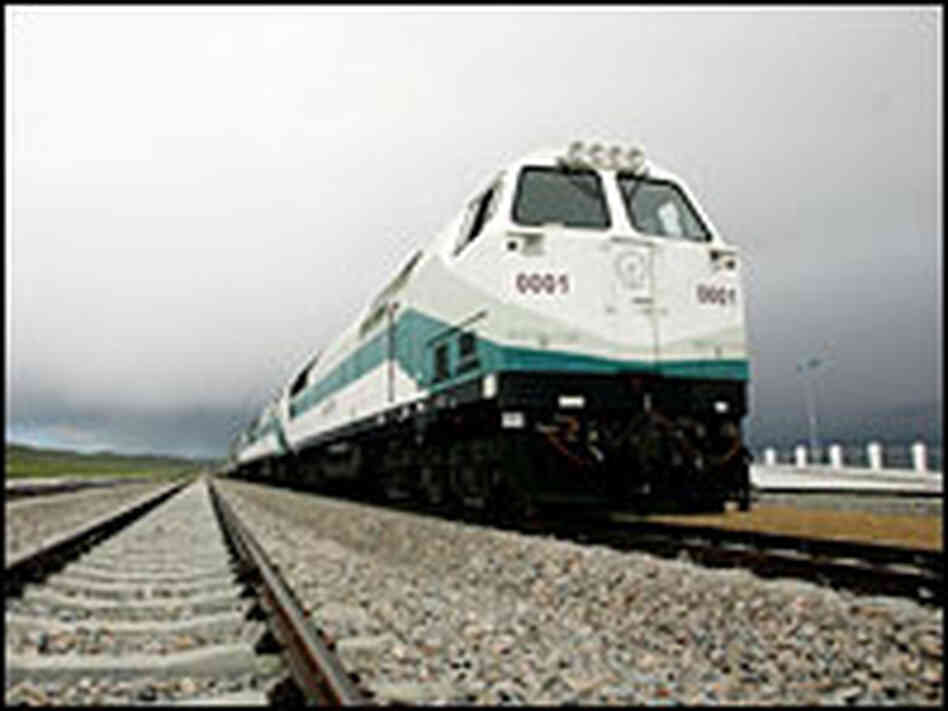 The first train to travel from Beijing to the Tibetan capital Lhasa arrives