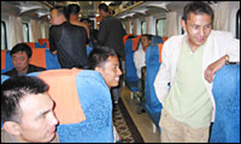 Chinese laborers and businessmen pay around 45 dollars for a simple seat on the train to Tibet.