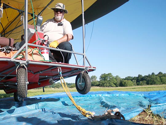 Nachbar sits in the blimp's "cabin."
