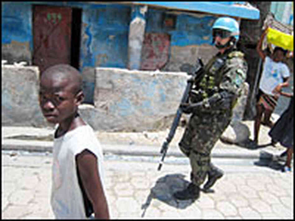 A Brazilian U.N. peacekeeper patrols the streets of Cite Soleil.
