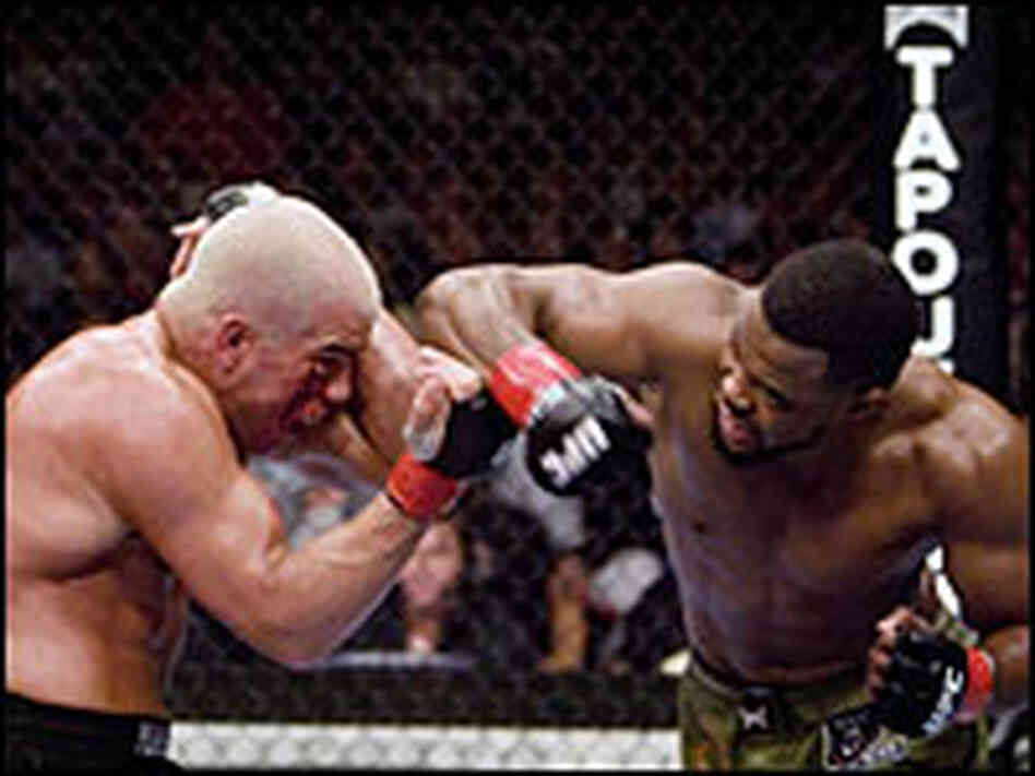 Tito Ortiz (left) battles Rashad Evans during the Sacramento UFC event. The fight ended in a draw.