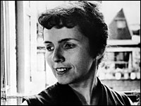 Grace Paley poses before an open window in Manhattan, 1959