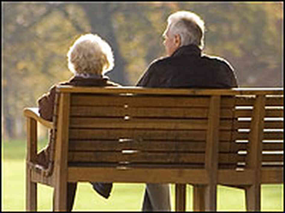 And older couple sitting on a park bench./iStockphoto.com And older couple sitting on a park bench./iStockphoto.com