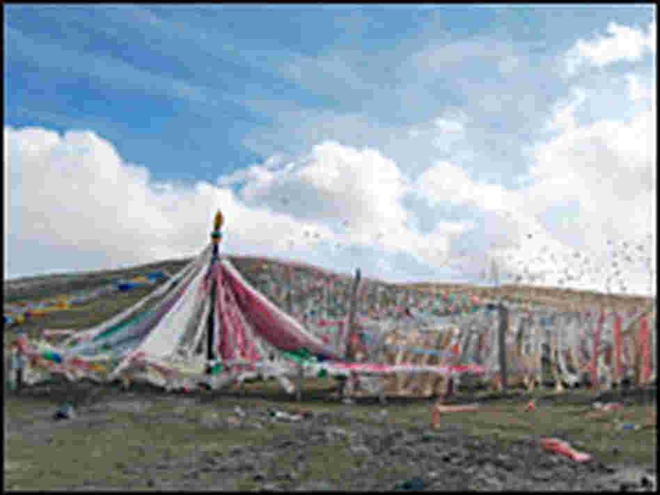 Prayer flags dot mountains in the area, a reminder of the traditional Tibetan way of life.