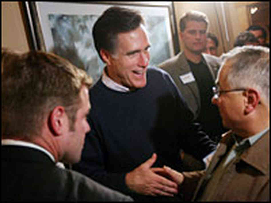 Presidential hopeful Mitt Romney (R-MA) meets with potential supporters in Dubuque, Iowa.
