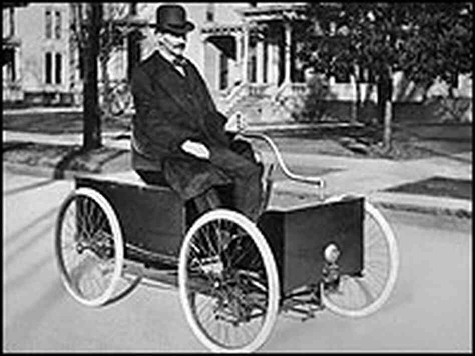 Henry Ford in his first automobile. Henry Ford in his first automobile.