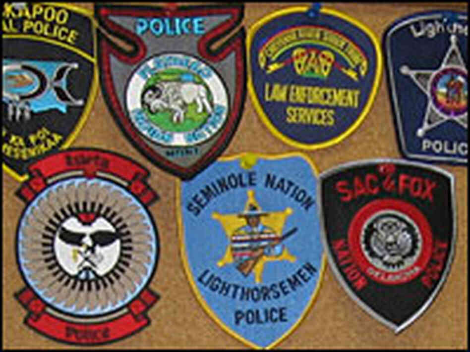 Patches from different tribal police forces