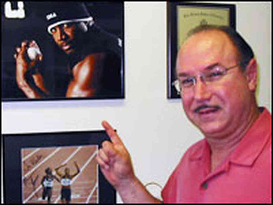 Victor Conte pointing to a photo Victor Conte pointing to a photo