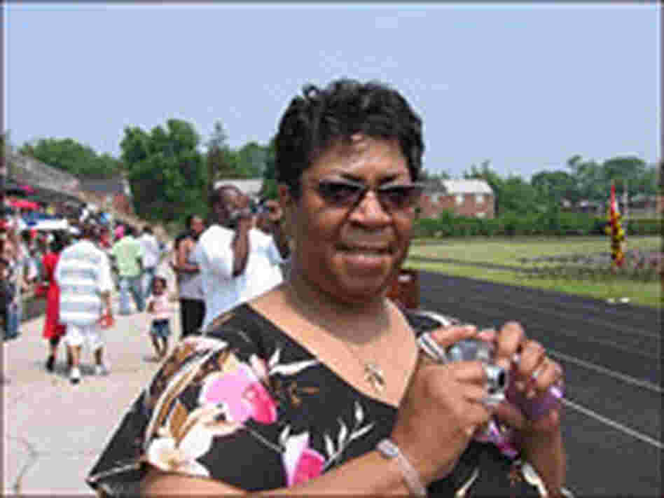 Marlene Harris Readies her Camera as Her Daughter Prepares to Graduate