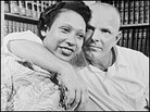 Richard Loving with his arm around his wife, Mildred Richard Loving with his arm around his wife, Mildred