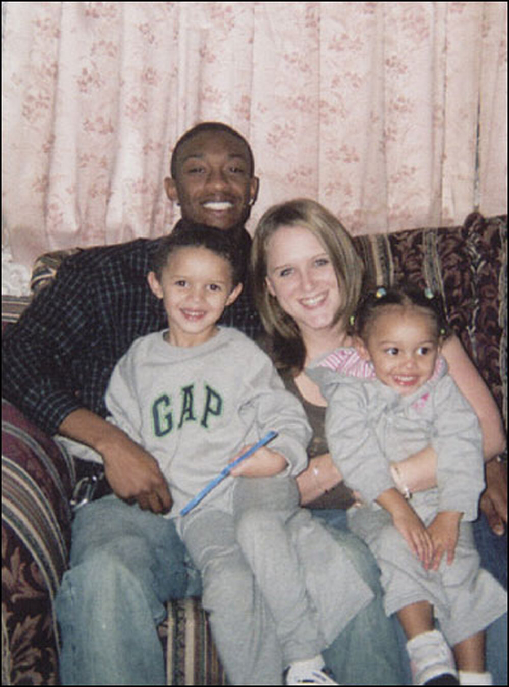 Bryan Walker, Anna Blazer, and their two children, Brianna and Brandon