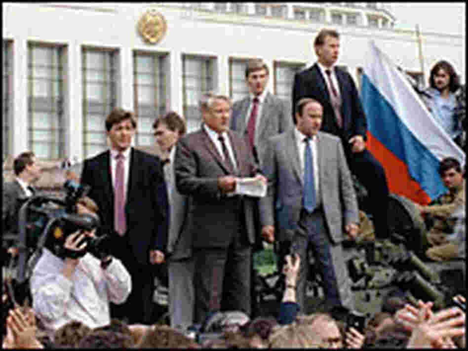 Russian President Boris Yeltsin speaks from atop a tank outside the government house in 199