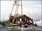 Launching a balsa raft. Launching a balsa raft.