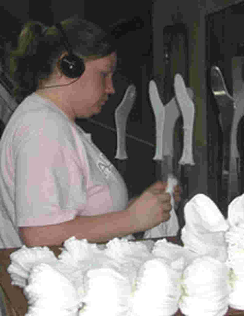 Worker in Fort Payne, Ala.