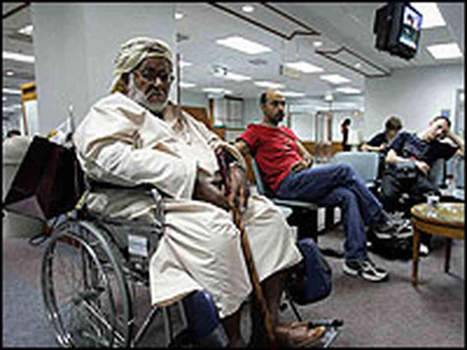 Foreign patients wait at a hospital in Bangkok, Thailand. Foreign patients wait at a hospital in Bangkok, Thailand.