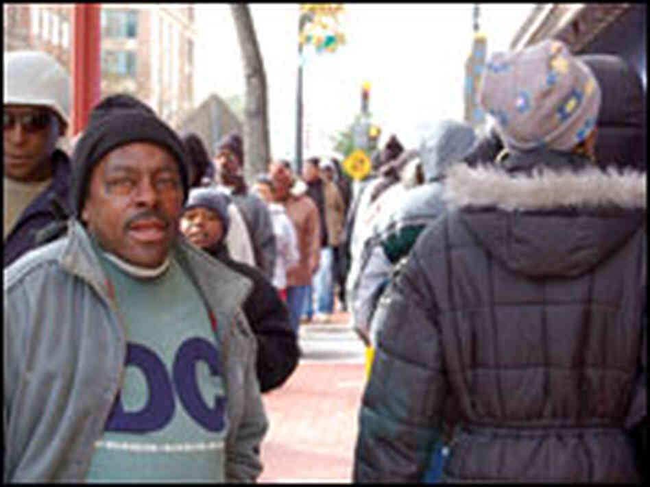 Protesters picket on behalf of the carpenters’ union