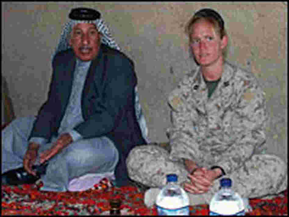 Capt. Ann Gildroy meets with tribal leaders in the southern Iraqi province of Qadisiyah.