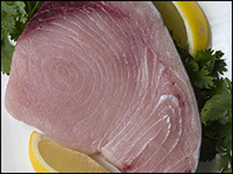 A swordfish steak. A swordfish steak.