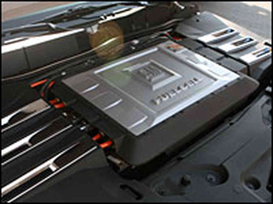 A peek under the car's hood reveals the fuel cell.