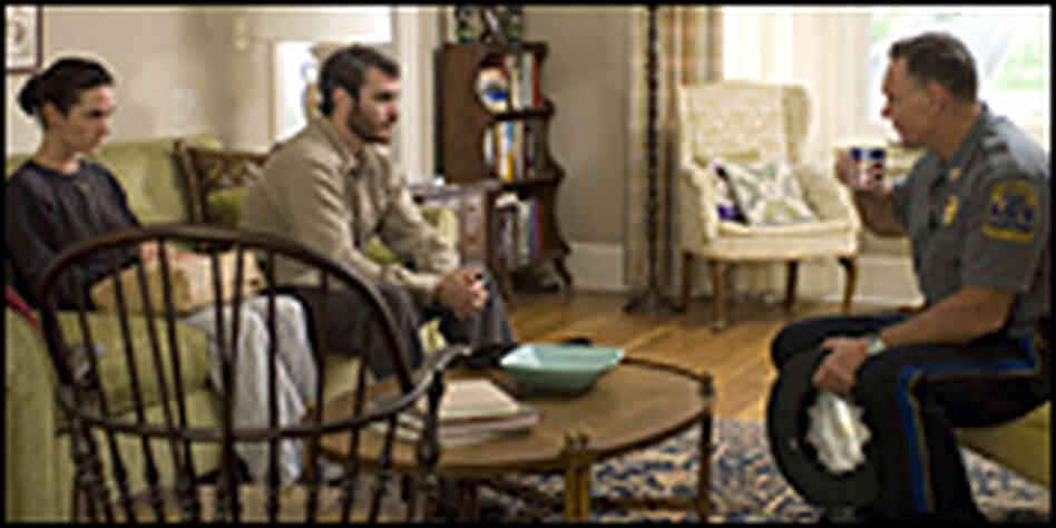 Jennifer Connelly, Joaquin Phoenix and Antoni Corone in 'Reservation Road' Jennifer Connelly, Joaquin Phoenix and Antoni Corone in 'Reservation Road'