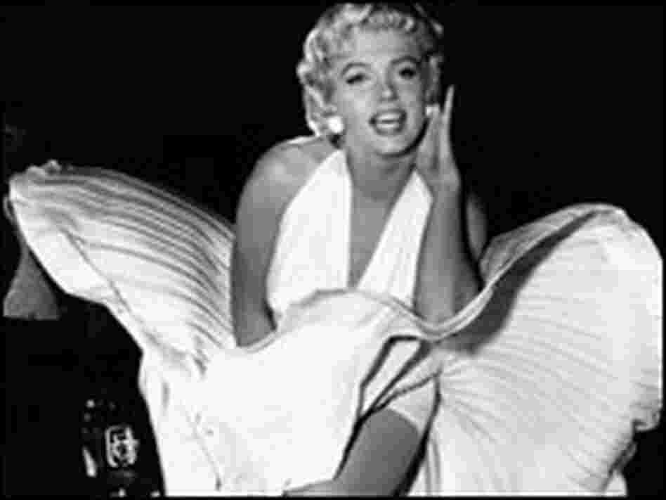 Monroe in a white dress.