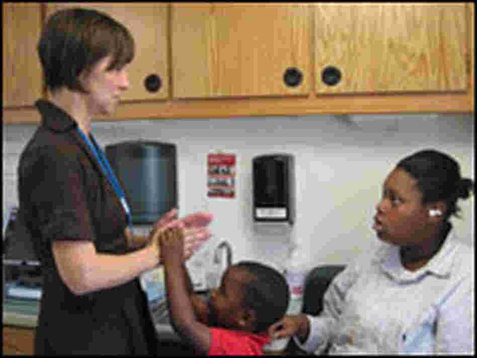 Dr. Heidi Sinclair with Darrell London and his mother, LaTonya