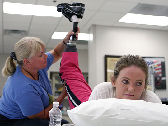 Army Spc. Sue Downes during physical therapy at Walter Reed