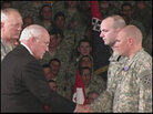Hinkle receives a Purple Heart. Hinkle receives a Purple Heart.