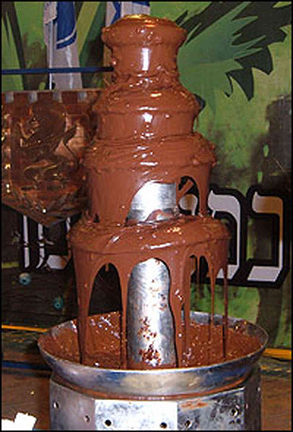 A chocolate fountain A chocolate fountain