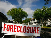 A foreclosure sign stands in the yard of a house in Southern California.