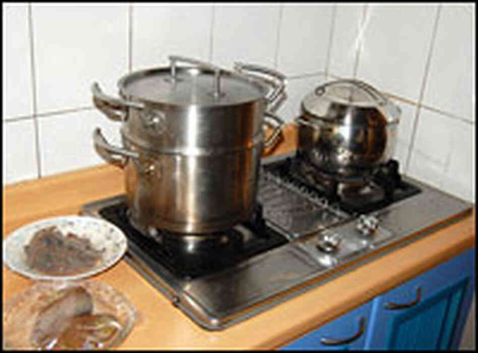The stovetop in the Sheng family's kitchen