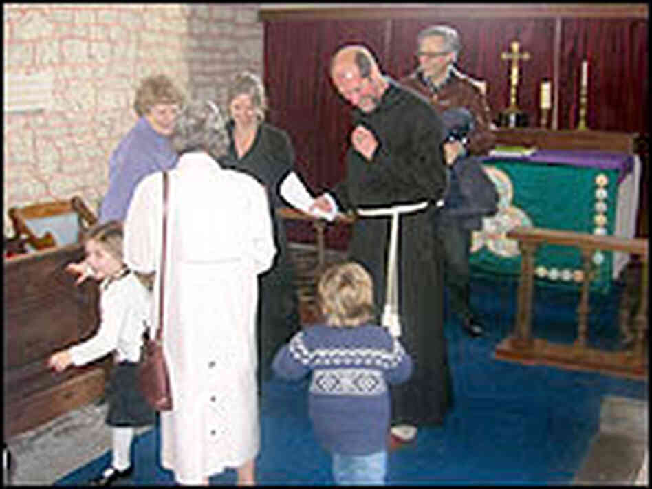 Martin Palmer greets parishoners Martin Palmer greets parishoners