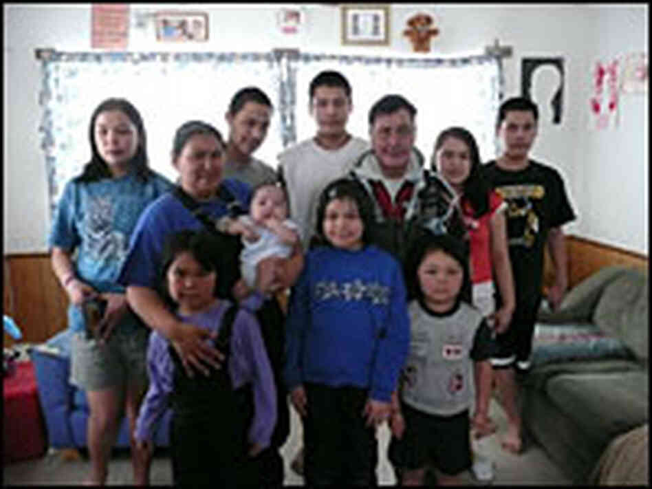 John Lockwood of St. Michael Alaska with his wife and their nine children.