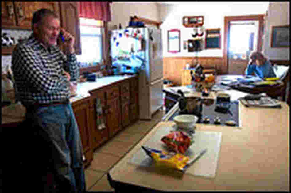 Craig and LaVon Griffieon work from the kitchen.