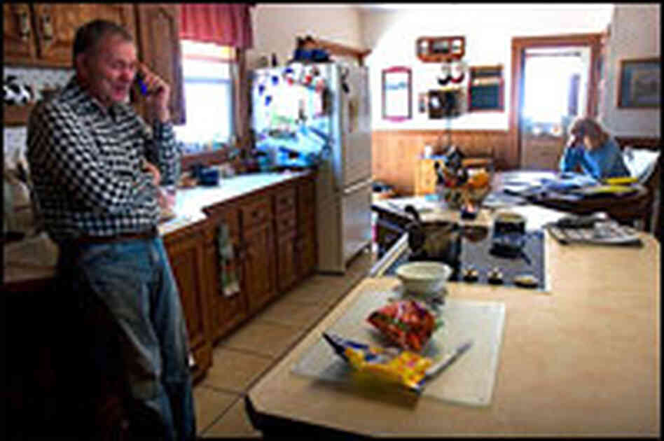 Craig and LaVon Griffieon work from the kitchen.