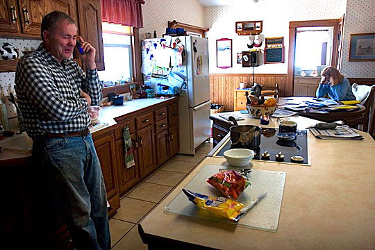 Craig and LaVon Griffieon work from the kitchen.
