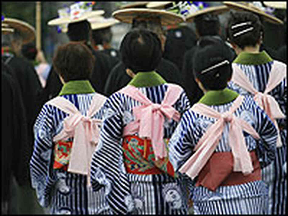 Women walking in downtown Tokyo Women walking in downtown Tokyo