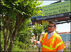 Hector Lizasuain tends to the trees along U.S. Highway 192 in Osceola County Fla. Hector Lizasuain tends to the trees along U.S. Highway 192 in Osceola County Fla.