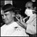 A barber wears a protective face mask during the 1918 flu pandemic. Credit: Bettmann/Corbis.