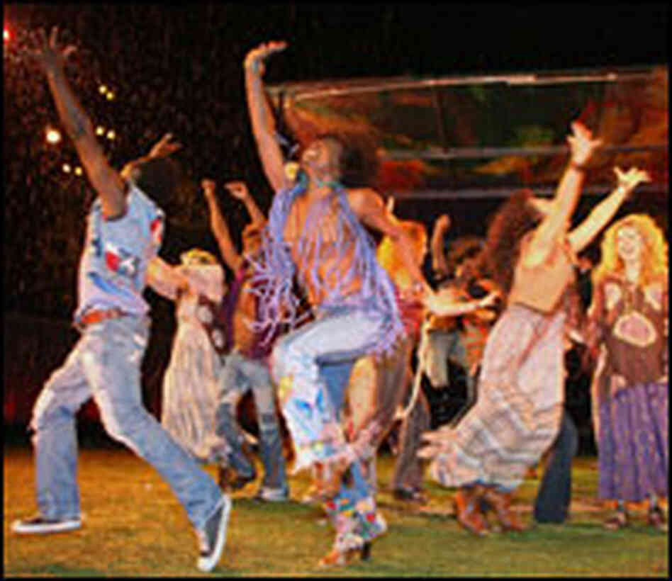 'Hair' cast dances wildly on the grass