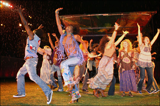 'Hair' cast dances wildly on the grass