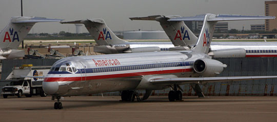 An MD-80 aircraft sits on the Dallas/Fort Worth International Airport.