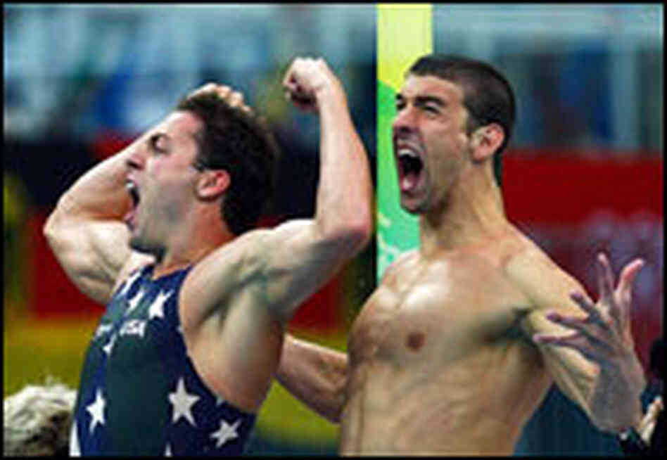 Garrett Weber-Gale, left, and Michael Phelps celebrate.